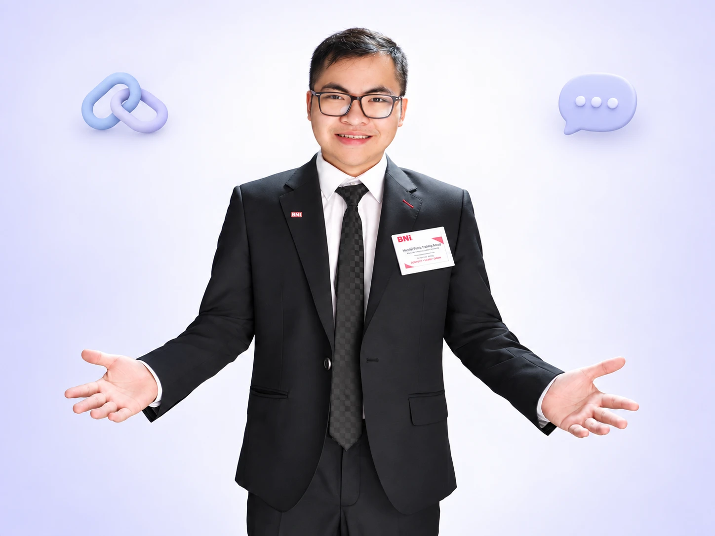 Nguyễn Khoa Trường Giang welcoming visitors with open arms in a suit